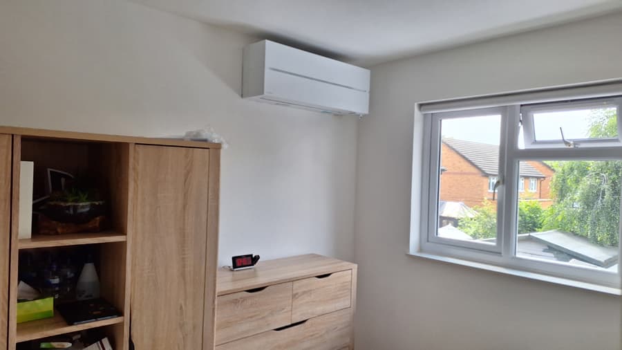 Residential air conditioning unit installed in bedroom