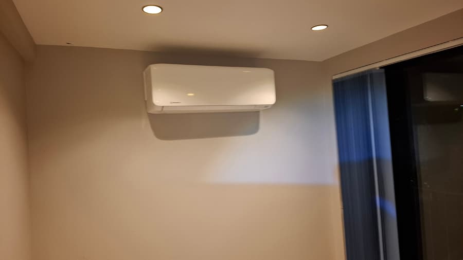 Indoor air conditioning unit with warm evening lighting