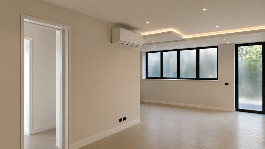 Modern living room with discreet wall-mounted air conditioning unit