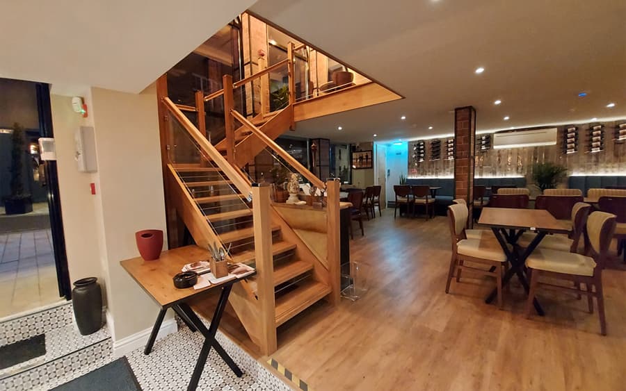 restaurant staircase and downlight feature lighting