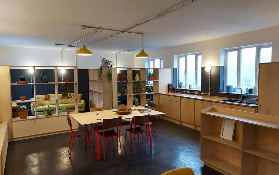 studio workspace track lighting and pendant installation