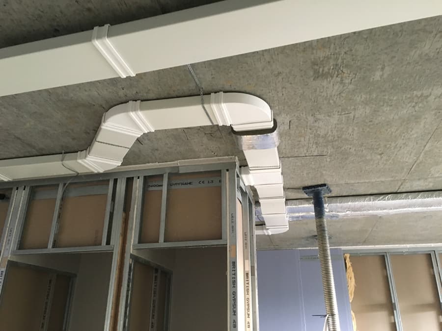 MVHR ductwork corner bend detail at ceiling junction