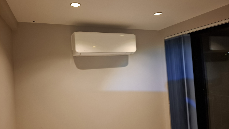 Indoor air conditioning unit with warm evening lighting